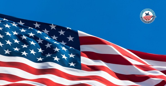American flag against a blue background