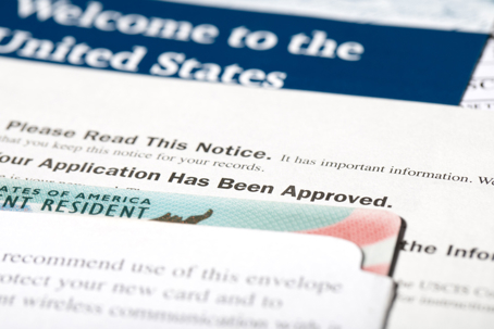 approval of a green card with welcome leaflet