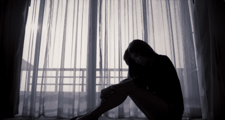 woman sitting on the floor 